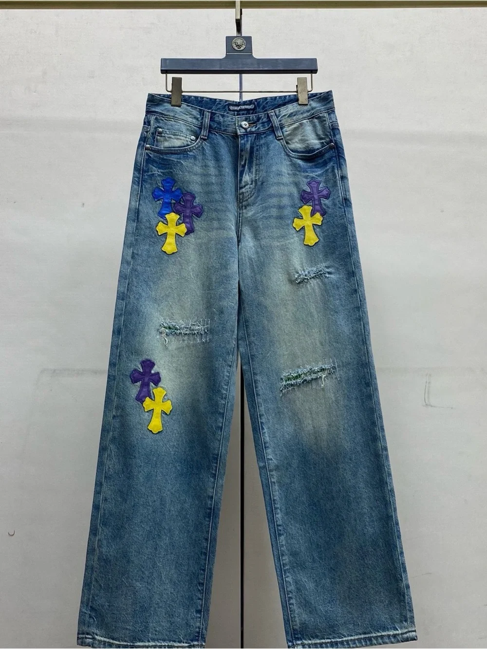 Chrome Hearts Blue Wide-Leg Jeans with Purple & Yellow Cross Appliqués